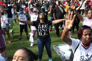 People attending a Juneteenth event Organized by the One Race Movement at Centennial Olympic Park today in Atlanta, Georgia.