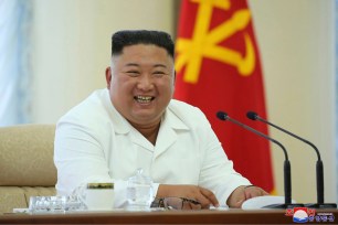 Kim Jong Un attends a meeting of the Politburo of the Central Committee of the Workers' Party of Korea in North Korea Sunday, June 7, 2020.