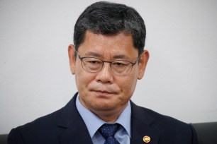 South Korean Unification Minister Kim Yeon-chul expresses his intention to resign during a meeting with reporters at the government complex in Seoul, South Korea.