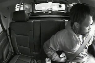 Newly released video shows Maurice Gordon as he unbuckles his seatbelt before exiting a New Jersey State Trooper's vehicle.