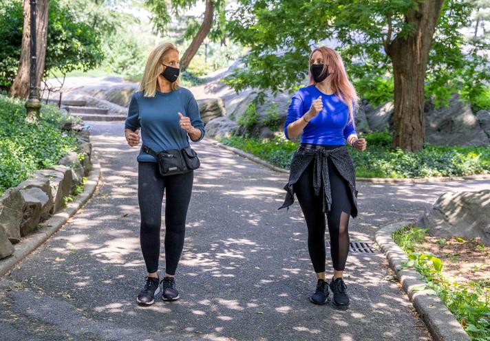 Event planner Lynne Goldberg (left) takes brides rescheduling their weddings and other clients on power walks in Central Park.