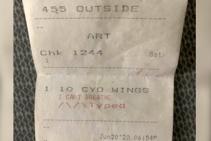 The receipt for blackened wings with "I can't breathe" on it.