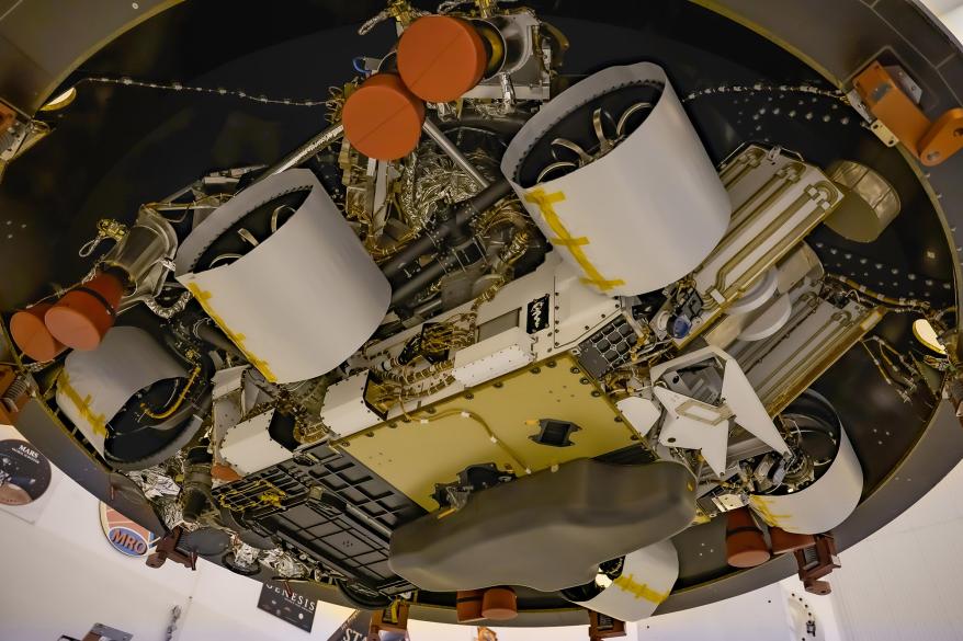 Seen from below, NASA's Mars 2020 Perseverance rover is in position in the aeroshell that will protect the rover on its way to the Red Planet.