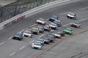 Bubba Wallace, driver of the #43 Victory Junction Chevrolet, leads the field during the NASCAR Cup Series GEICO 500 at Talladega Superspeedway