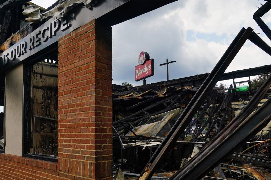 The burned down Wendy's restaurant where Rayshard Brooks was killed in the parking lot.