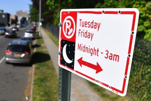 A street sign showing NYC Alternate Parking Rules