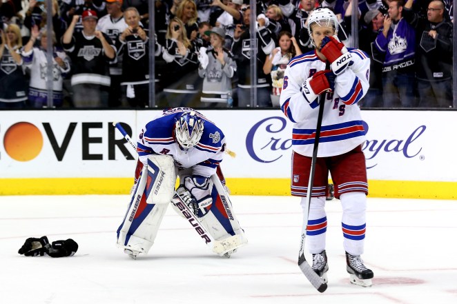 Anton Stralman and Henrik Lundqvist react after losing to the Kings in Game 5 of the 2014 Stanley Cup.