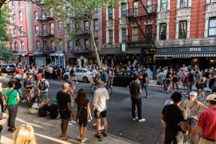 Crowds of people enjoying the good weather on St Marks Place between 1st Avenue and Avenue A in the East Village, Manhattan on Friday June 12, 2020 in New York City, USA.