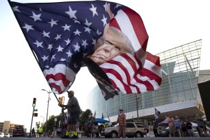 Trump supporter stands out BOK Center in Tulsa, Oklahoma