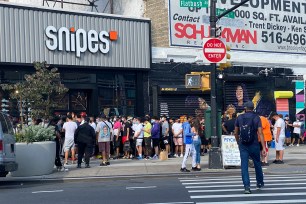 A long line outside the Brooklyn Snipes during the first day DJ Khaled's sneaker hit the market.