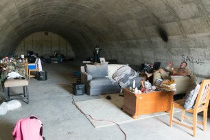 Milton Torres (lounging at right) quit his job in Chicago to live full-time in this bunker at the XPoint “survival community” in South Dakota. “I close the door and stay in there for a few days and then I can think again,” he says, as the site’s developer boasts that sales of the $35,000 dwellings are up “over 600 percent” in the wake of the coronavirus pandemic.