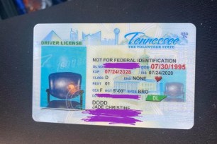 Jade Dodd's driver's license features an image of an empty chair.