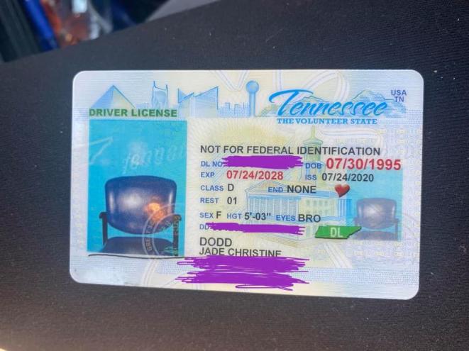 Jade Dodd's driver's license features an image of an empty chair.