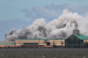 Smoke rises from a chlorine production plant fire after Hurricane Laura passed through.