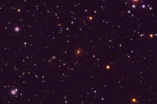 TXS 0128+554, outlined in red here, is an elliptical galaxy located 500 million light-years away in the constellation Cassiopeia.