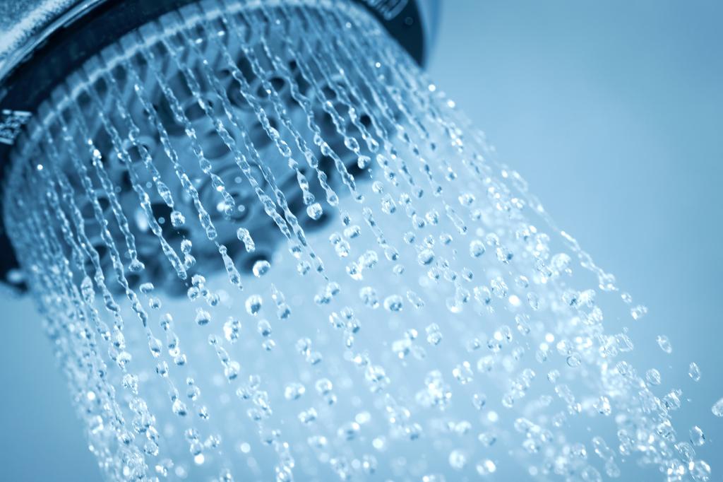 Water flowing from a shower head