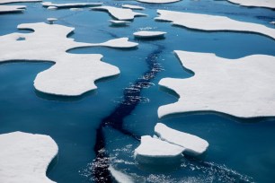 Sea ice breaks apart as the Finnish icebreaker MSV Nordica traverses the Northwest Passage through the Victoria Strait in the Canadian Arctic Archipelago.