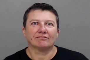 Pascale Ferrier appears in a jail booking photograph taken after her arrest