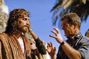 Actor Jim Caviezel and director Mel Gibson on the set of the 2004 film "The Passion of the Christ."