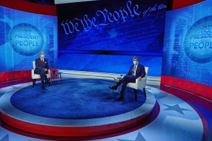 Joe Biden and George Stephanopoulos at the ABC News-hosted town hall.