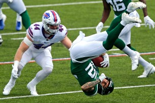 Ashtyn Davis get tackled in the Jets opener against the Bills