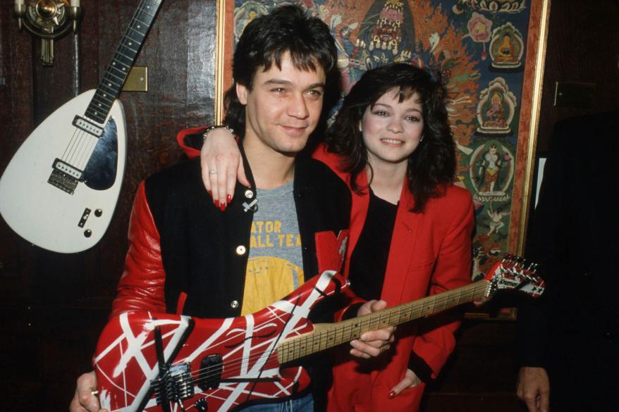 388497 01: Eddie Van Halen of the rock group Van Halen stands with his wife Valerie Bertinelli February 18, 1995 in New York City. Van Halen donated his guitar to vice president Eric Crisman to be displayed at the Hard Rock Cafe. (Photo by Forrest Anderson/Liaison)