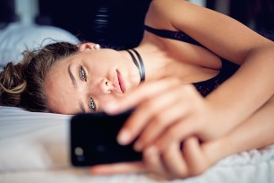 Woman lying in bed