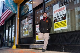 Keith McAlarney standing outside of Mac’s Public House in Staten Island.