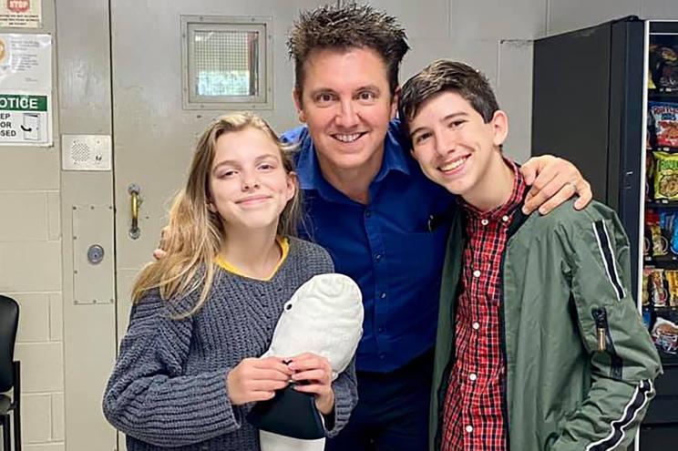 Brooklyn and Kadan Rockett with their father at the Green Oaks Detention Center in Louisiana.