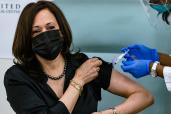 Kamala Harris is administered the Moderna COVID-19 vaccine by Registered Nurse Patricia Cummings at the United Medical Center.