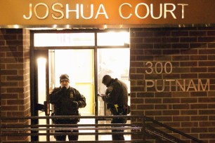 NYPD cops at the scene of a fatal stabbing at 300 Putnam Ave. in Brooklyn