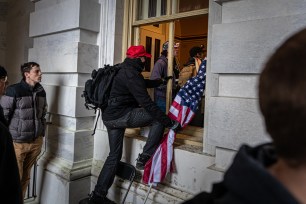 Trump supporters breaching the US Capitol.