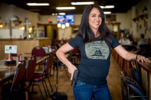 Lauren Boebert poses for a portrait at Shooters Grill in Rifle, Colorado, in 2018.