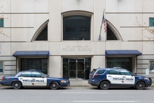 A City of Portland Police Bureau Sports Utility Vehicle SUV and patrol cruiser car.