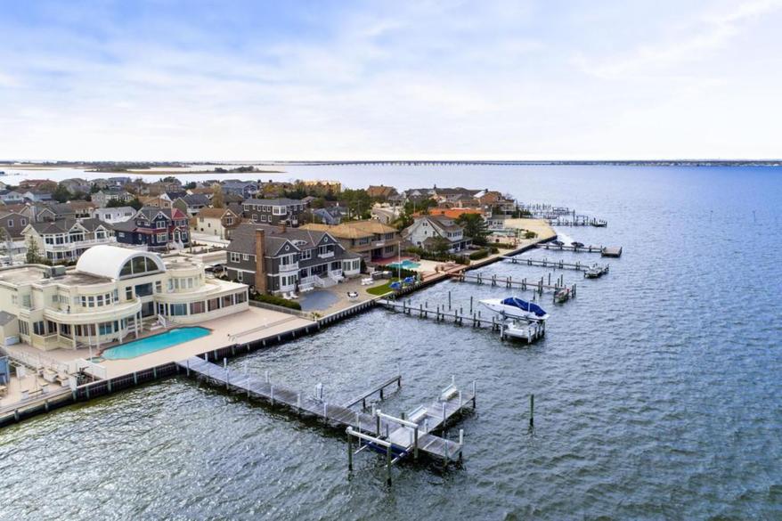 Pesci is reportedly annoyed with his neighbors' docks, which he says are too long.