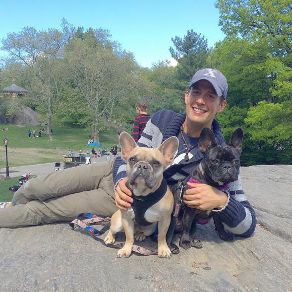 Ryan Fischer, Lady Gaga's dog walker, with dogs Koji and Asia.