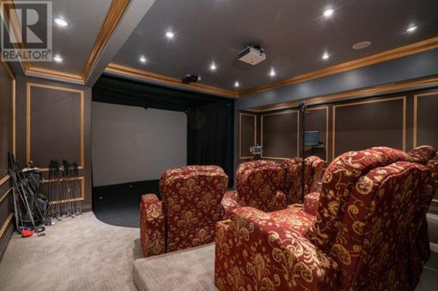 It has a home theater with seating for eight.