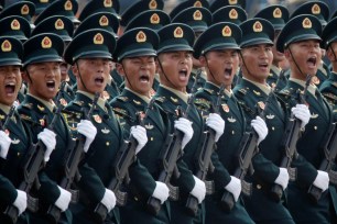 Soldiers of People's Liberation Army (PLA) march in formation past Tiananmen Square during the military parade marking the 70th founding anniversary of People's Republic of China, on its National Day in Beijing, China October 1, 2019.