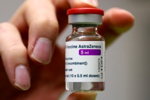 Medical staff prepares an AstraZeneca coronavirus vaccine during preparations at a vaccine center in Ebersberg near Munich, Germany.