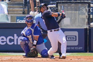 Gleyber Torres watches the first of his two home runs today.