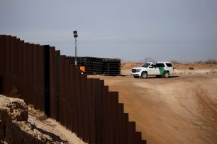 A border patrol agent at the border wall Sunland Park, New Mexico on February 12, 2021.