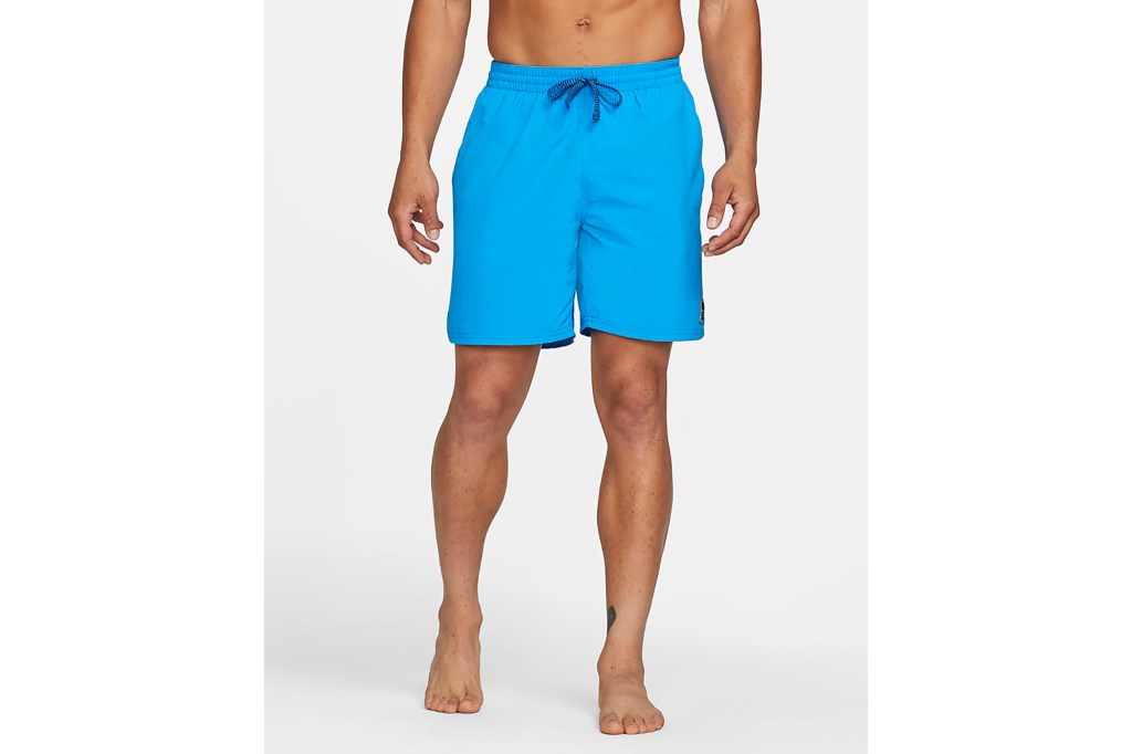 A man in blue swim trunks