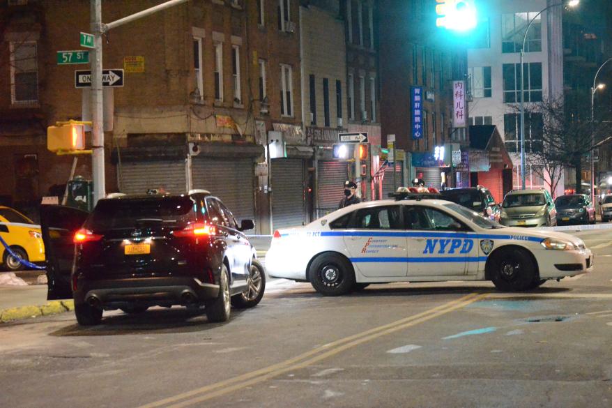 NYPD at the scene of a fatal stabbing at a Brooklyn gambling den