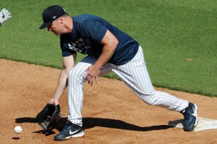 Jay Bruce does fielding drills at first base during spring training with the New York Yankees in 2021.