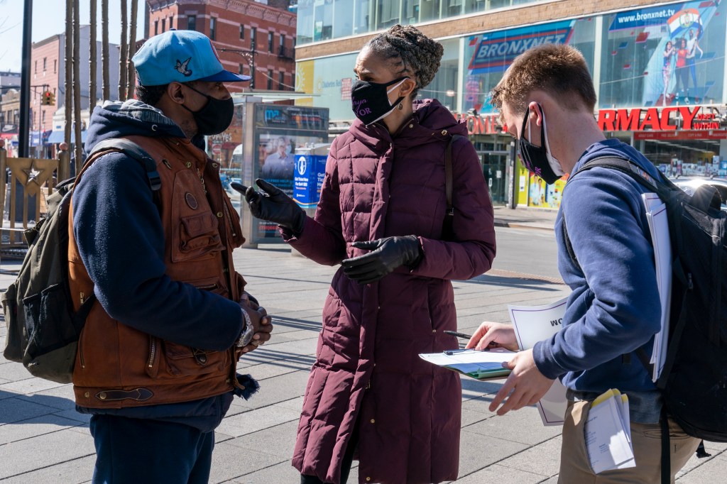 New York City mayoral candidate Maya Wiley, center, speaks to a potential voter at a campaign stop in the Bronx on March 3, 2021. 