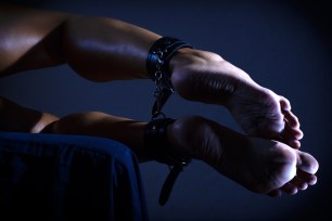 A woman left shackles on her coffee table before her boyfriend's mom came to visit.