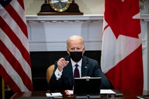 U.S. President Joe Biden participates in a virtual bilateral meeting with Prime Minister Justin Trudeau of Canada in the Roosevelt Room of the White House
