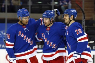 Brendan Smith (center) is making big plays for the Rangers.