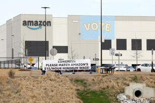 Banners are placed at the Amazon facility as members of a congressional delegation arrive to show their support for workers who will vote on whether to unionize, in Bessemer, Alabama, U.S. March 5, 2021.