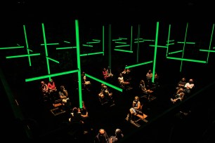 Audiences sit in socially distanced pods and listen to a play on headphones during the new off-Broadway show "Blindness."